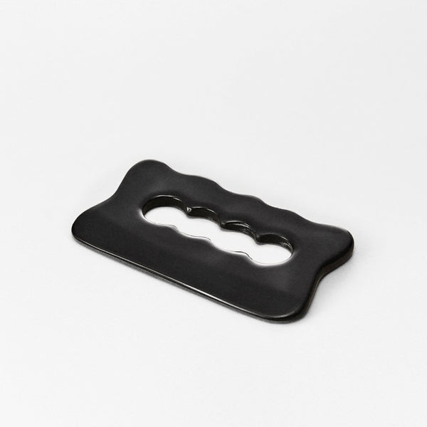 The Body Gua Sha by MANTLE - black bian body massage tool