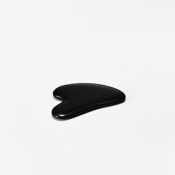 The Gua Sha from MANTLE - black bian massage tool