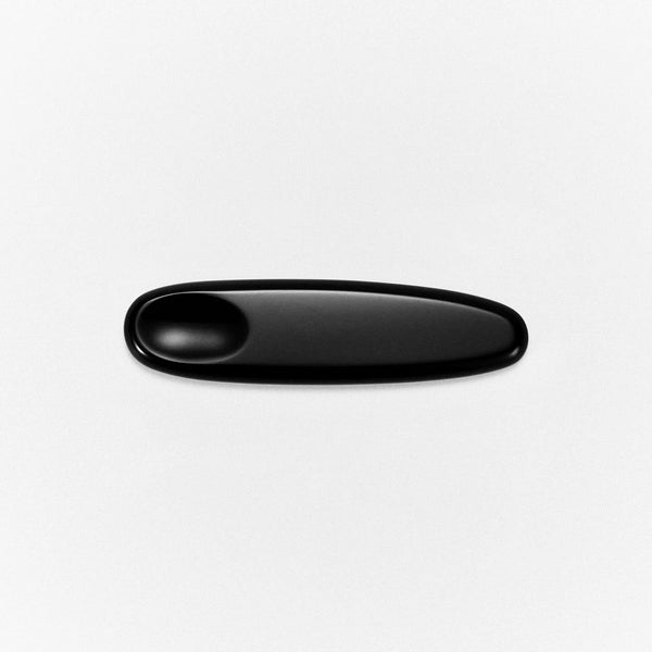 The Spatula from MANTLE - black bian applicator for mess-free skincare application